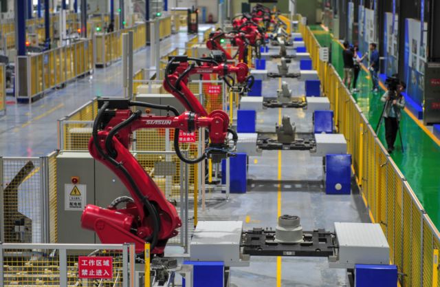 An automated robot production line at SIASUN Robot &amp; Automation Co., Ltd. High-density IoT deployments could put monitoring tags on everything in this picture.