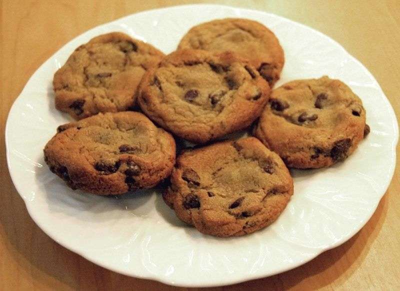 A plate of chocolate-chip cookies.