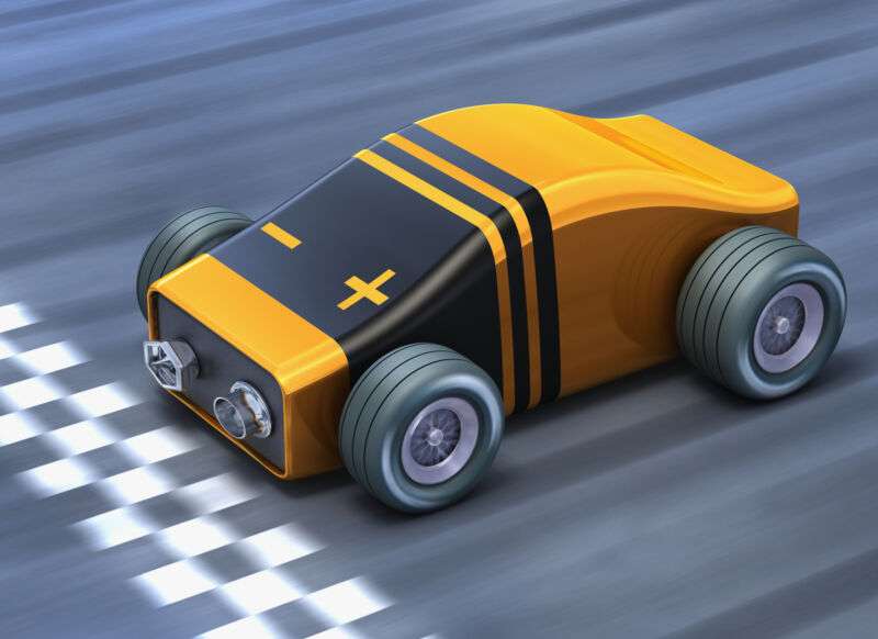 A cartoon race car appears to be made out of a comically shaped 9-volt alkaline battery.